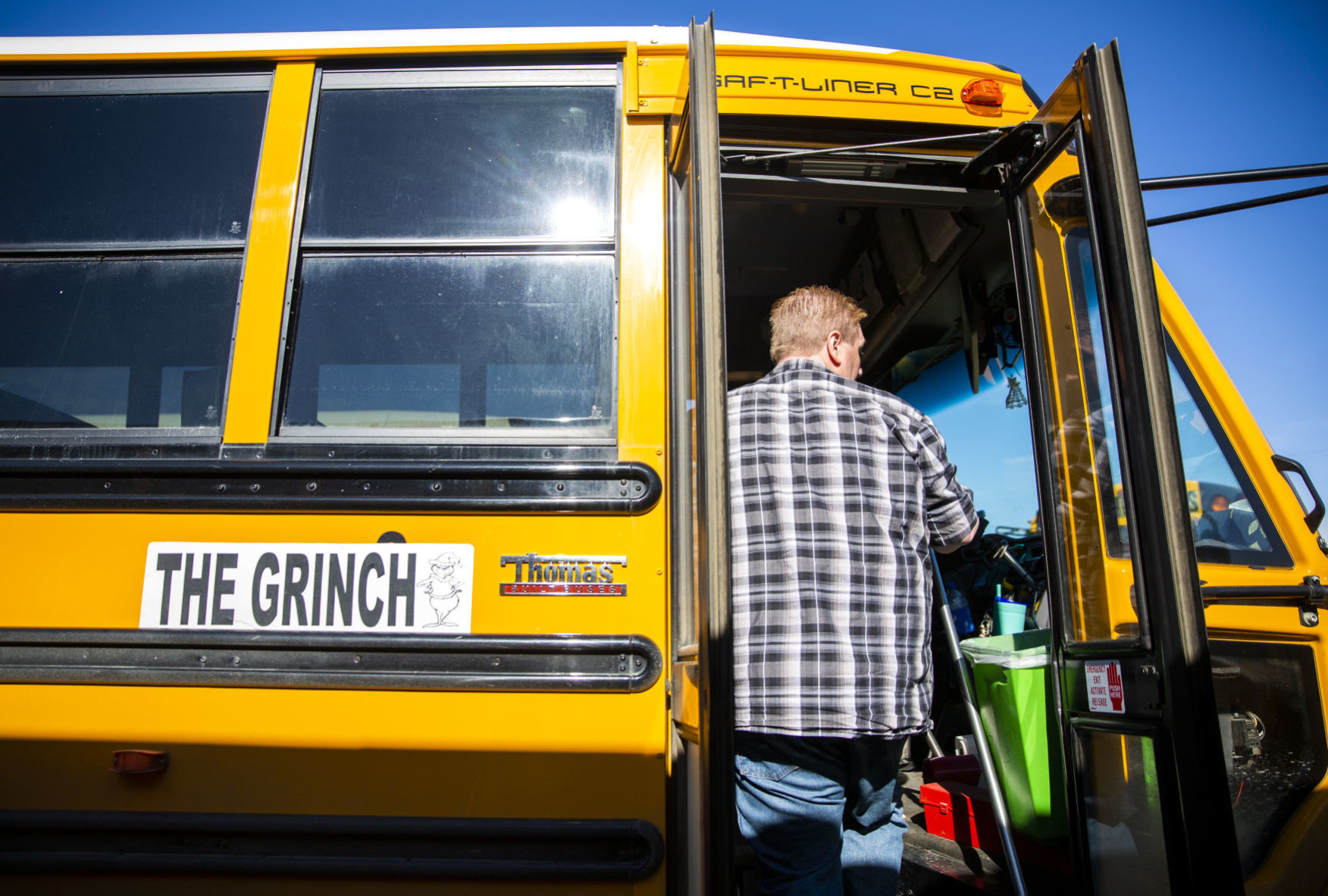 Bus drivers deliver food to students